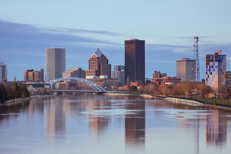 Rochester, NY Insurance - Rochester Skyline Reflecting off the Water, Sky Turning Purple